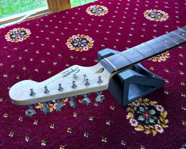 Guitar Neck block for restringing your instruments with ease, 3d printed for electric or acoustic guitars